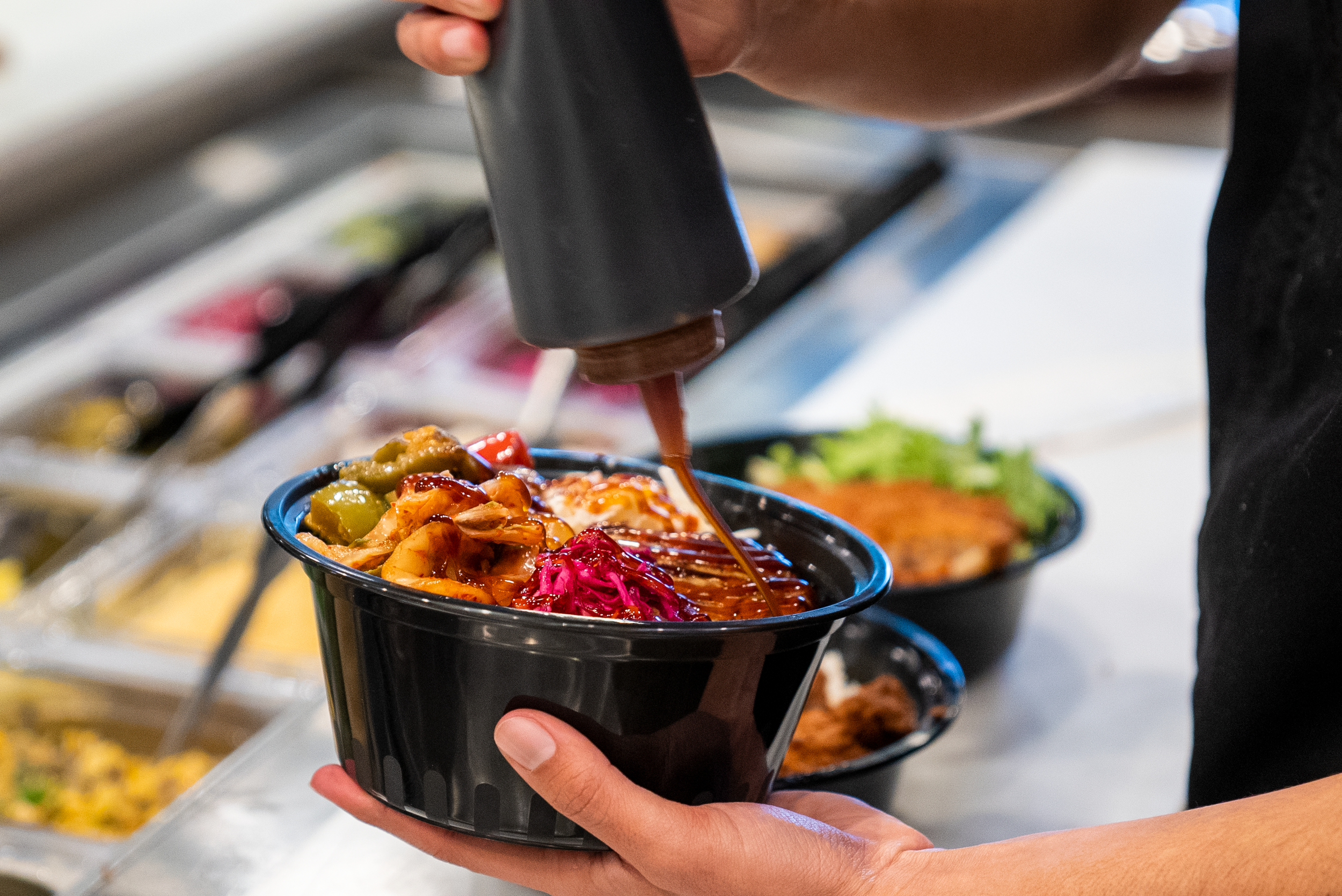 Fresh poke bowl being prepared